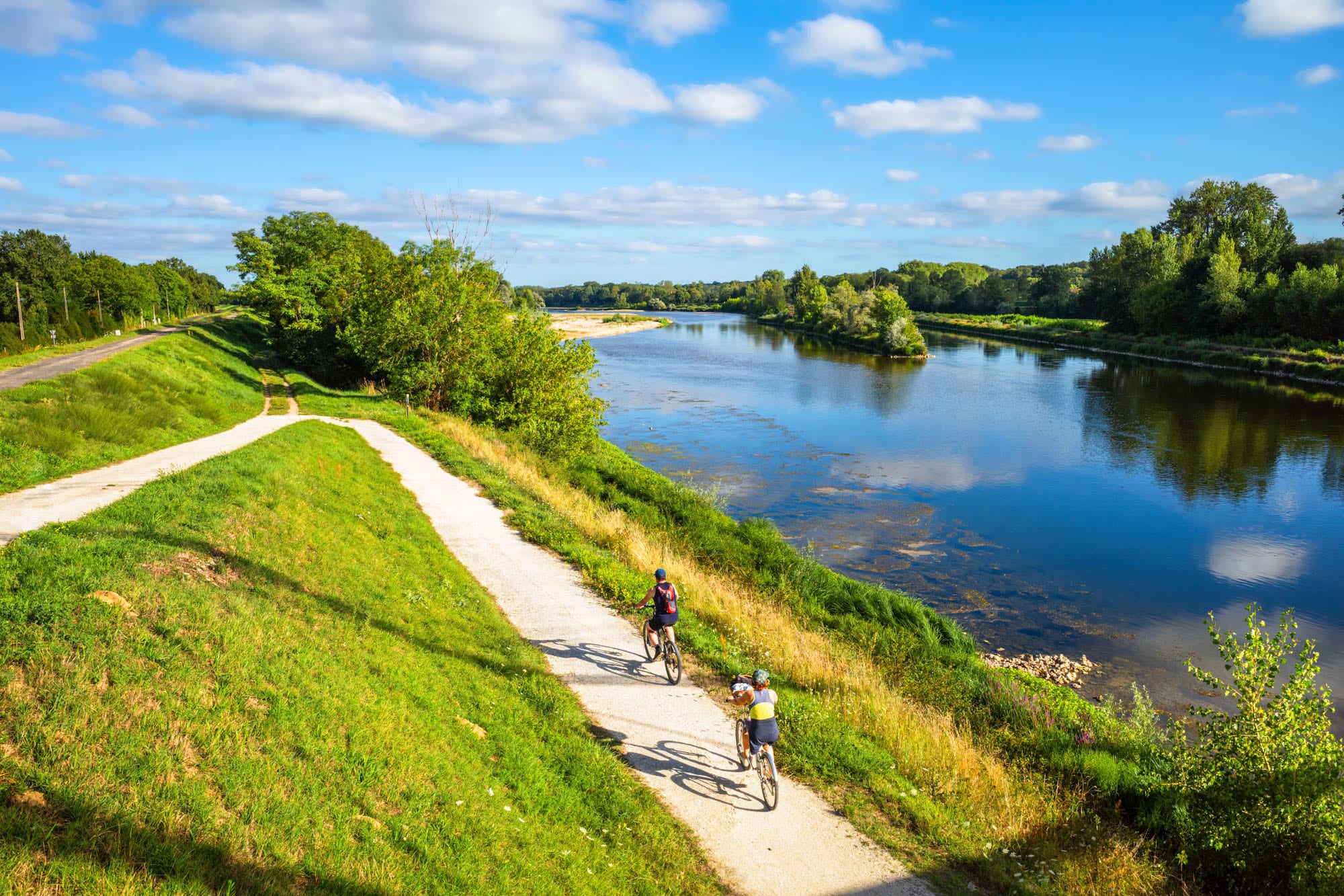 Cyclist along the Loire River in France